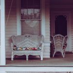 Wicker seating on a porch.