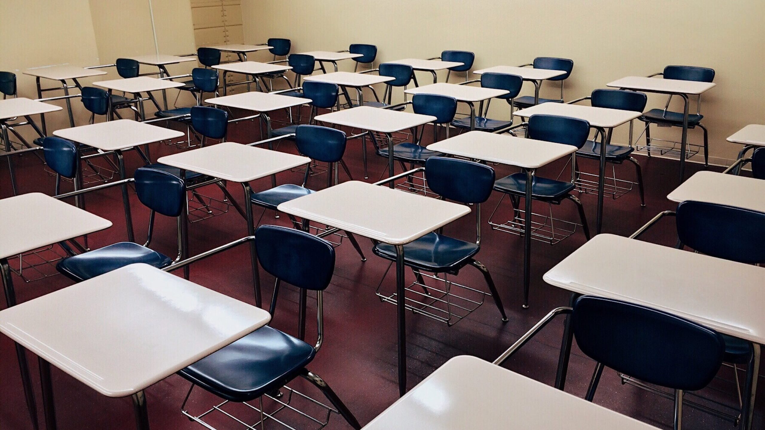 Empty desks in a classroom