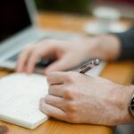 Man writing in a notebook