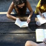 Group of people reading and writing together